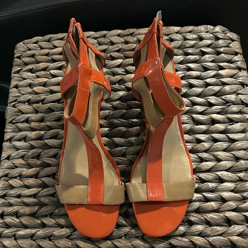 Nine West orange and camel sandals.